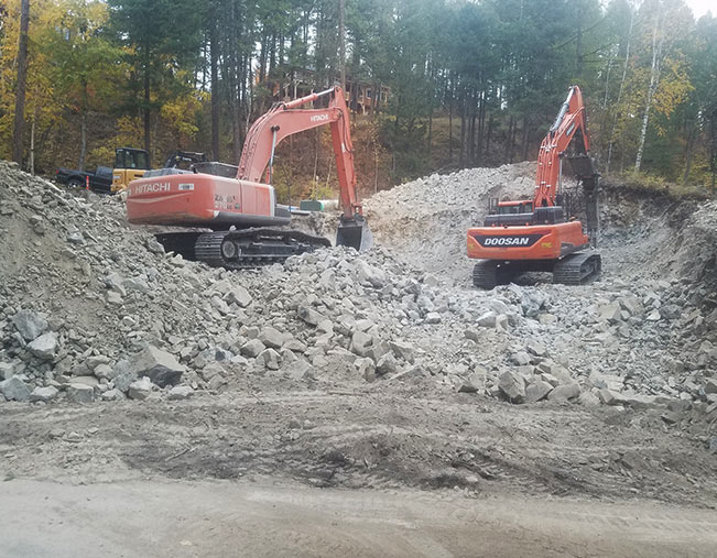 Neumann Construction Co. Rock Hammer Services - Kalispell MT & The Flathead valley